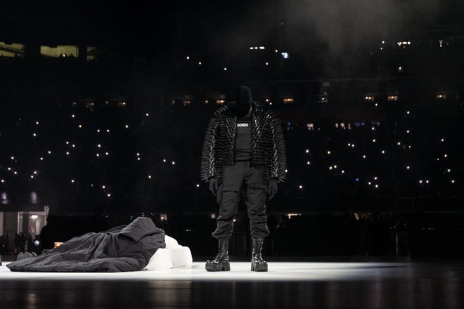 Kanye West went with an all-black ensemble for his second "Donda" listening event at Mercedes-Benz Stadium in Atlanta on Aug. 5, 2021.