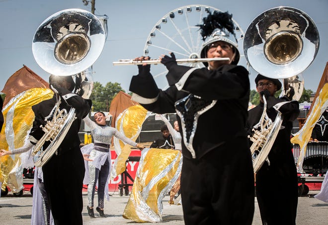 Muncie Central competes during Band Day at the Indiana State Fair in 2021, when it won the championship. Local bands will be back at the annual competition on Friday, Aug. 5, 2022.