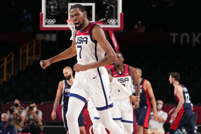 Kevin Durant (7) reacts in the second half of the gold-medal game against France at the Tokyo Olympics.