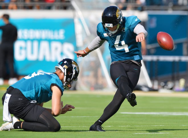 Jaguars P (9) Logan Cooke holds for K (4) Josh Lambo during Sunday's scrimmage session. The Jacksonville Jaguars held their practice session Sunday, August 8, 2021 in front of a limited number of fans on the turf at TIAA Bank Field in Jacksonville, FL.