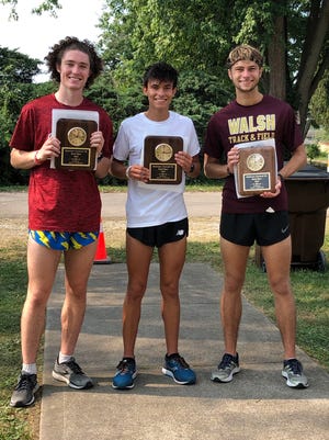 Heath graduate Xavier Foehl, center, won the Baltimore Festival 5K on Saturday morning. Lakewood graduate Anthony Toskin, right, took runner-up and Licking Valley graduate Ramen Felumlee placed third.