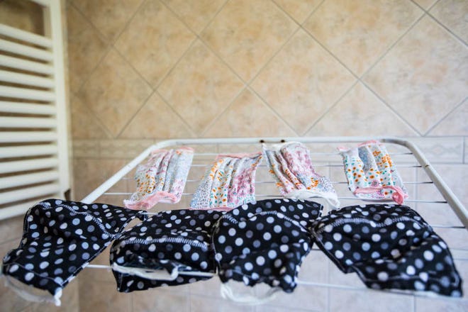 Cloth face masks can air dry after they're washed.