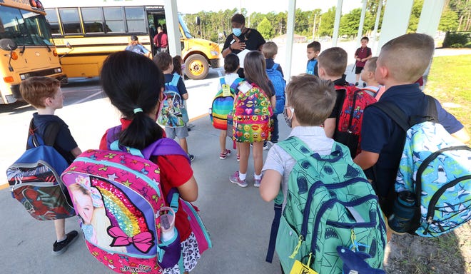Kindergarteners at Rymfire Elementary School gather on the first day of school in August 2021.