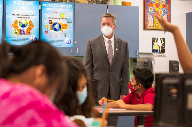School District Superintendent Mike Burke observes a 6th grade social studies class at Conniston Middle School in West Palm Beach Tuesday, Aug. 10, 2021, the first day of the school year.
