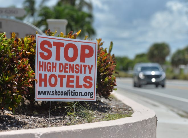 Signs posted by residents opposed to high density hotels can be seen in numerous locations around Siesta Key.