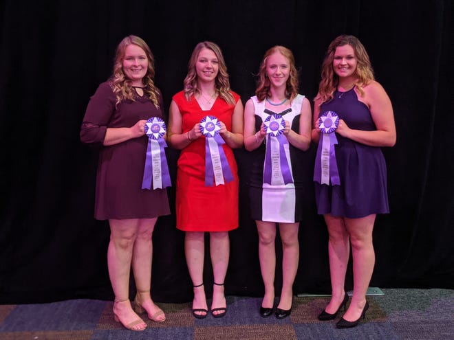 Marie Haase, from left, Courtney Glenna, Katherine Elwood, and Grace Haase of Polk County won the senior division of the National Holstein Dairy Bowl Contest in Lancaster, Pennsylvania.