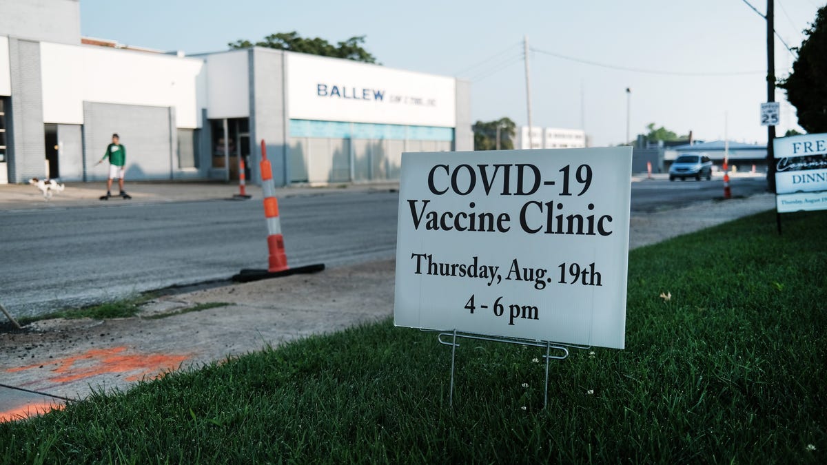 A sign for a vaccination clinic is displayed on a lawn of a church on August 06, 2021 in Springfield, Missouri. According to the latest numbers from the state's health department, only a little more than 4 in 10 Missourians have received the COVID vaccine as the pandemic continues to infect thousands of residents. Communities with high rates of unvaccinated residents have been hit especially hard by the Delta variant, the unvaccinated representing the overwhelming   majority of hospitalized patients.