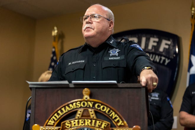 Williamson County Sheriff Mike Gleason said he has refused to sign management agreement for 911 dispatchers because it could give non-law enforcement officials access to criminal records.