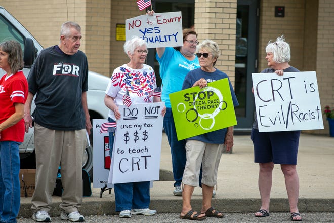 A Stop Critical Race Theory demonstration outside of a Cincinnati area school district Monday, August 10, 2021.