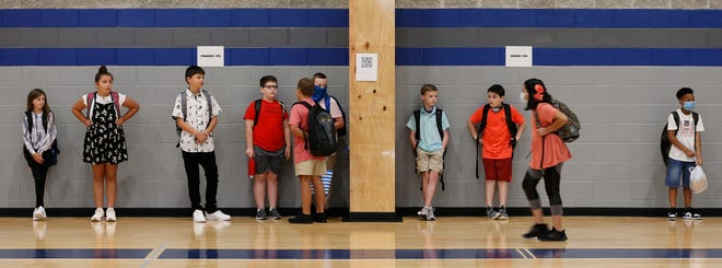 Students gather for the first day of classes at Northport Intermediate School on Thursday, Aug. 12, 2021.[Staff Photo/Gary Cosby Jr.]