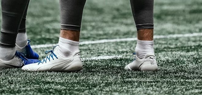A look at Lions punter Jack Fox's cleats, which sport a No. 90 on the heels for Fox's former teammate at Rice, Blain Padgett, who died in 2018.