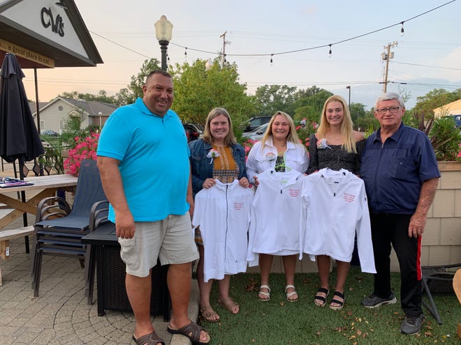 Kelsey Wolfe was honored as the Wayne County All-Stars Student-Athlete of the Year earlier this week at TJ's Restaurant, earning the distinction because of her play on the softball field and performance in the classroom. She will receive a total scholarship of $2,000, paid out in $500 increments over four years. Hannah Baker and Reese King were the other two finalists, earning $500 scholarships. Pictured (left to right): Pat Honza, Hannah Baker, Reese King, Kelsey Wolfe, Dick Stull.