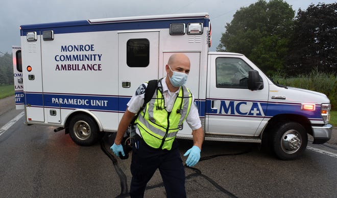 Monroe Community Ambulance (MCA) Supervisor Ben Forche on the scene of a car accident last week.