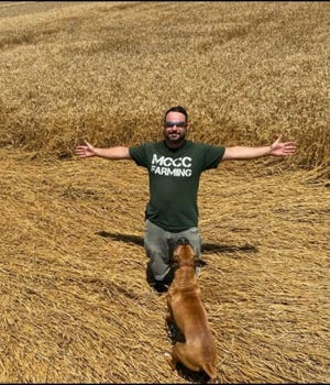 Nick Beaudrie, shown in a wheat field here, is the recipient of the Outstanding Agriculture Student Award for 2020 at Monroe County Community College.