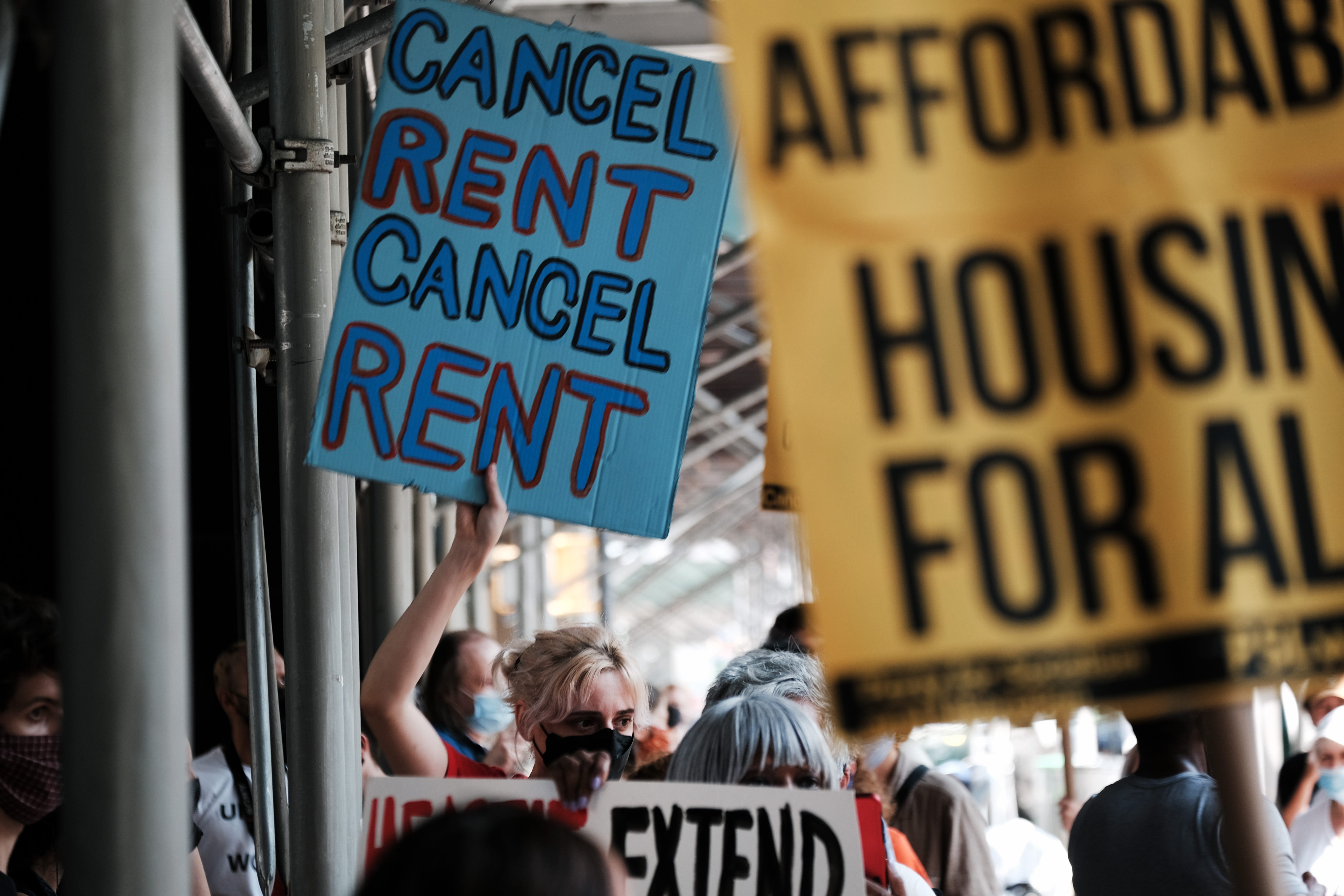 NEW YORK, NEW YORK - AUGUST 11: Activists hold a protest against evictions near City Hall on August 11, 2021 in New York City. New York state’s current eviction moratorium is set to expire on August 31. The Emergency Rental Assistance Program, which was created in the state budget and is meant to cover a year’s worth of rent and utility bills for tenants at or below 80% of area median income, has struggled to address the thousands of caseloads of tenants facing eviction. (Photo by Spencer Platt/Getty Images) ORG XMIT: 775694795 ORIG FILE ID: 1333596328