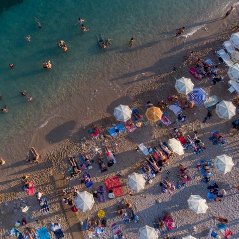 Holiday makers refresh themselves in Adriatic sea 