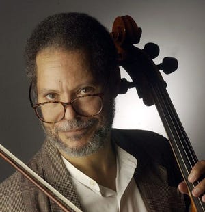 Ulysses Kirksey, shown in this undated photo, joined the Petersburg Symphony Orchestra in 1980. By the end of the decade, he moved from the string section to the conductor's podium and stayed there for more than 30 years.