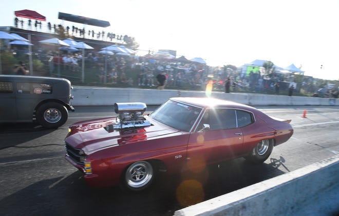 Drag racing at 'Roadkill Nights Powered by Dodge' on Woodward, across from the M1 Concourse in Pontiac.