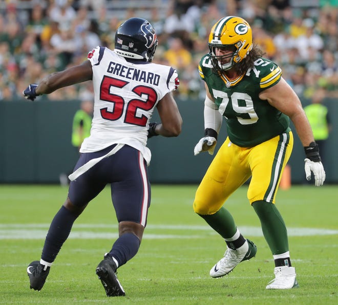 Green Bay Packers tackled Dennis Kelly (79) provides pass protection from Houston Texans defensive end Jonathan Greenard (52) during their preseason game Saturday, August 14, 2021 at Lambeau Field in Green Bay, Wis. The Houston Texans beat the Green Bay Packers 26-7.