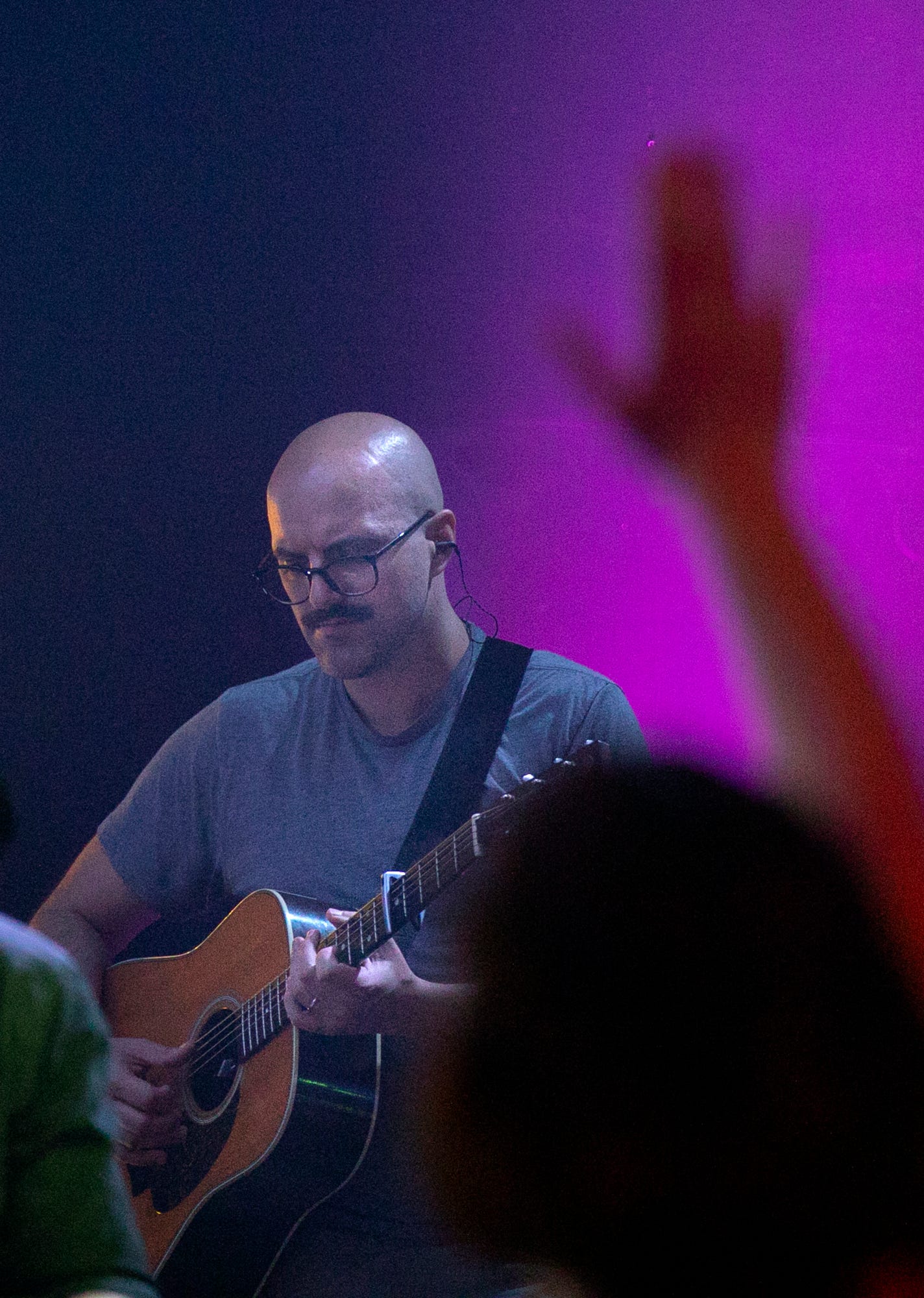 Chris Graham plays guitar in LIFE Vineyard Church's band on the Near East Side, where he has become involved in church again.