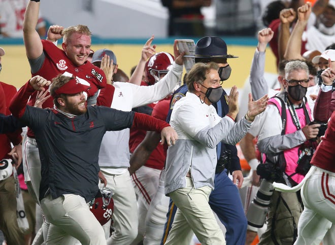 Alabama coach Nick Saban celebrates after the Crimson Tide defeated Ohio State in the College Football Playoff championship game in Miami Gardens in January. Mark J. Rebilas-USA TODAY Sports