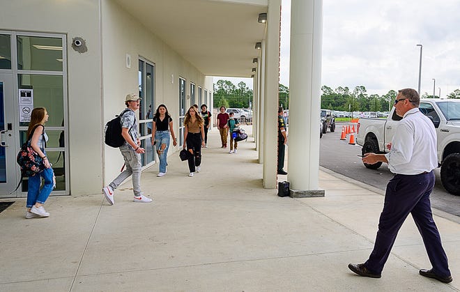Tocoi Creek High School Principal Jay Willets talks to students on the first day of school Monday, Aug. 16, 2021.