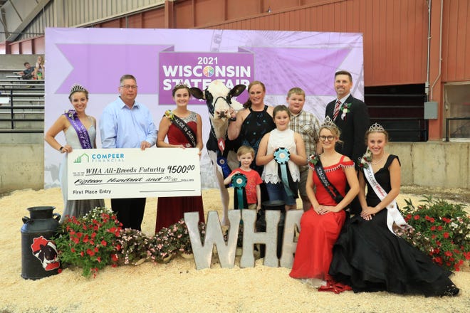 Dreamfix Splash of Sun-ET exhibited by Landon and Mylie Wendorf, Kylie Nickels, and Christian Sachse, of Ixonia earned Best Bred & Owned, and Best Udder of Show Best Bred & Owned  during the WHA All-Breeds Futurity.