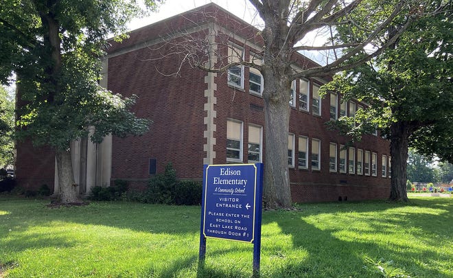 The Erie School District has always considered renovating the 90-year-old Edison Elementary School as part of the district's sweeping plan to upgrade its buildings. But the district now is reviewing where to buiid a new school to replace the existing building, at 1921 East Lake Road, shown here on Thursday. The new building could go up to the south of the existing building, or the area in the back right of this photo.