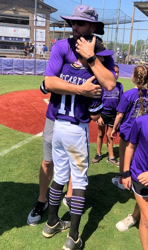 ACU head baseball coach Rick McCarty hugs his son Myles McCarty after the Wylie Little League team won the Texas West state tournament last season in Abilene. Dad is as assistant with his son's team which won the Texas West state tournament this year and will play in the Southwest Regional on Thursday in Waco. Wylie draws Louisiana in the first round.