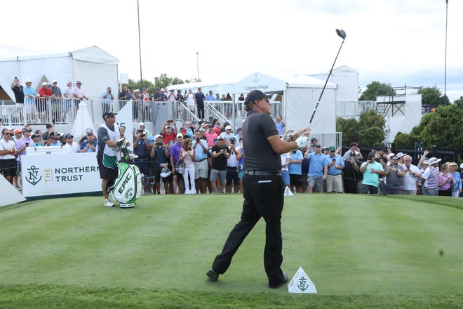 Phil Mickelson draws a crowd as he tees off on 15 during the opening round of the Northern Trust Golf Tournament part of the PGA Tour being played at Liberty National Golf Club in Jersey City on August 19, 2021.