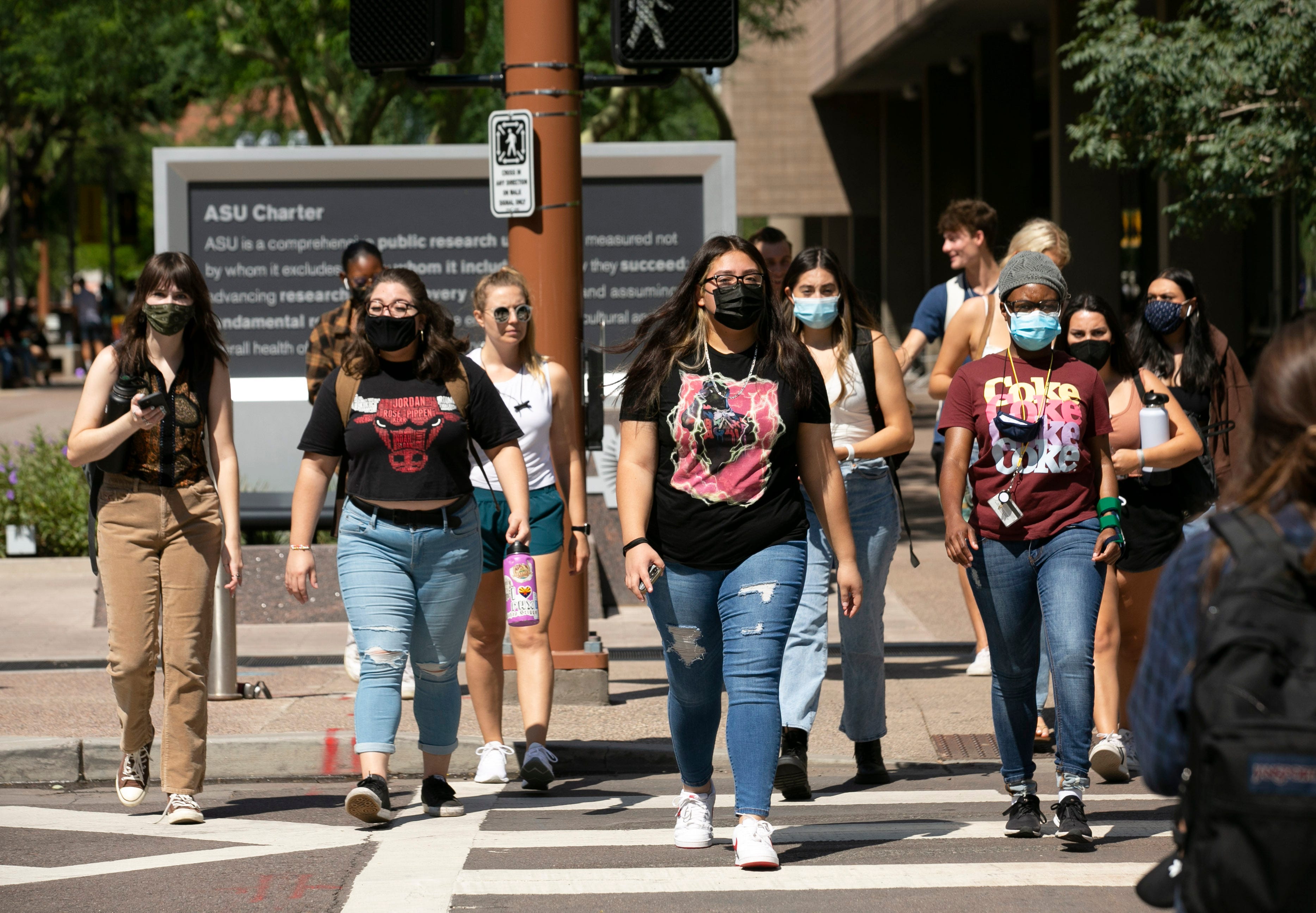 Students walk on ASU's downtown Phoenix campus during the first day of in-person classes on Aug. 19, 2021.