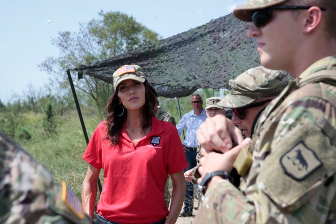 South Dakota Gov. Kristi Noem visits the U.S. border with Mexico on Monday, July 26, 2021, near McAllen, Texas. The Republican governor deployed roughly 50 National Guard troops to help with Texasâ€™ push to arrest people crossing illegally and charge them with state crimes. (AP Photo/Stephen Groves)