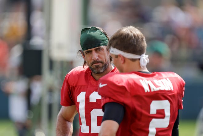 Green Bay Packers quarterback Aaron Rodgers (12) and New York Jets quarterback Zach Wilson (2) during a joint training camp practice on Wednesday.