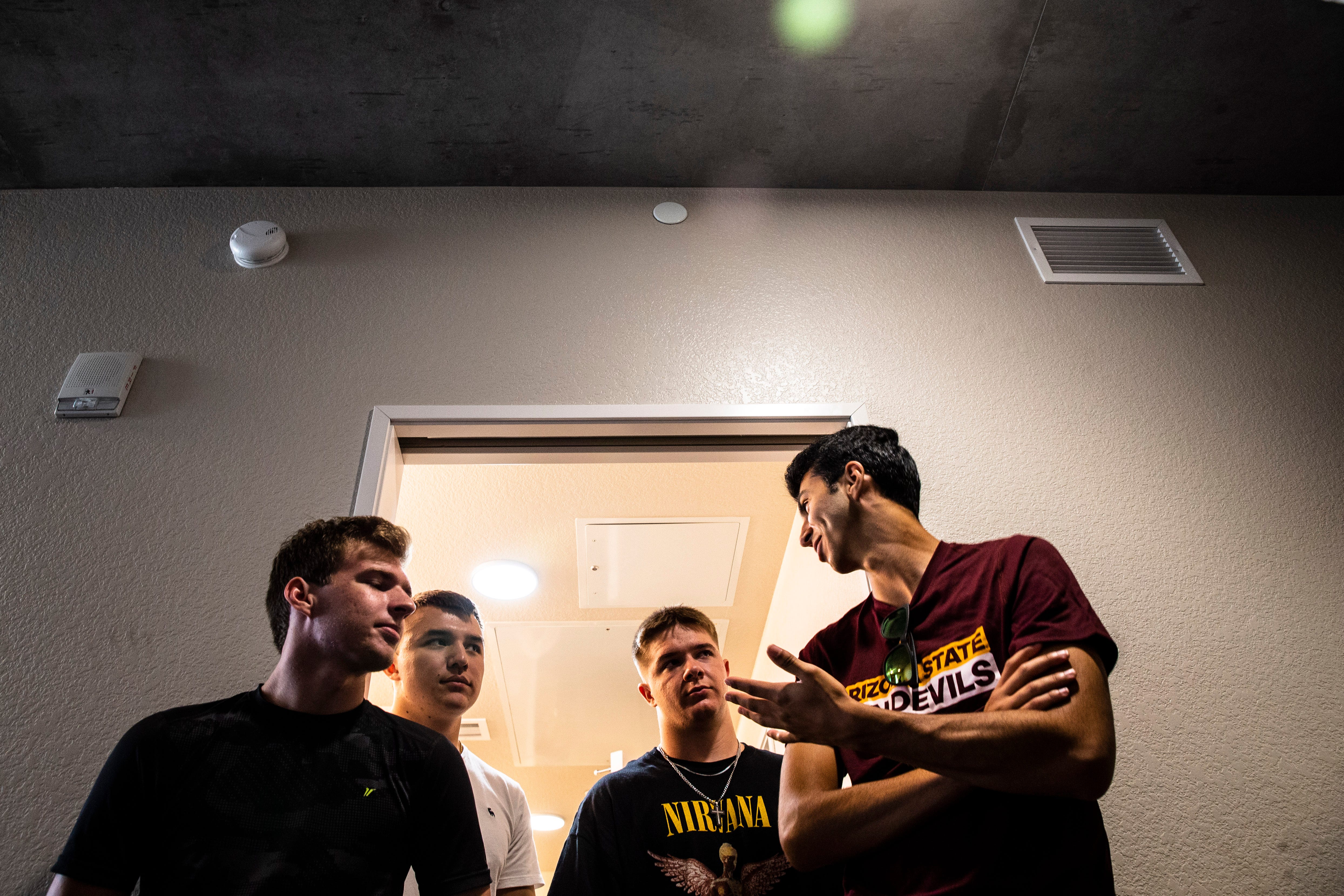 From left, Austin Kennedy, Owen Eaton, Logan Hall and Andrew Fontana moved into their dorm suite last weekend at Arizona State University in Tempe. Kennedy said he hoped other students would get vaccinated to reduce the chances of having class go online again.