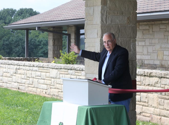 Bob Fonte, Stark Parks director, gives remarks during the opening of the Harold S. Fry Visitor's Center at Fry Family Park near Magnolia last August. Fonte, who has headed the parks district for more than 25 years, is retiring in 2022.