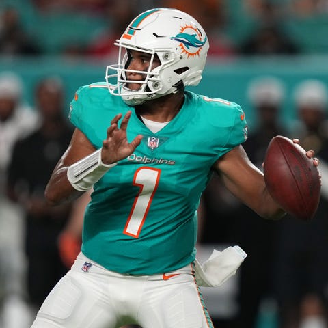 Miami Dolphins quarterback Tua Tagovailoa drops ba