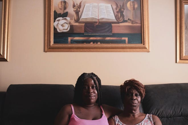Susie Mitchell, left, and her mother, Shirley, in the living room of their Whitehaven apartment. The women are facing an eviction unless their application for support from Emergency Rental Assistance program comes through.