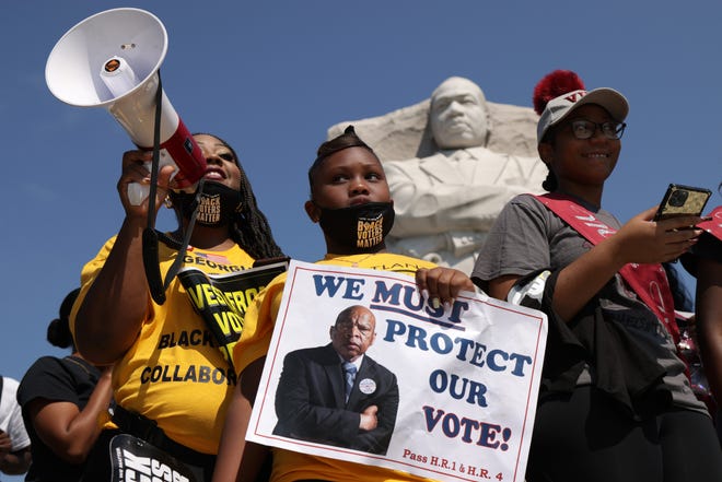 A protest for voting rights at the Martin Luther King, Jr. Memorial on Aug. 6, 2021, in Washington, D.C.