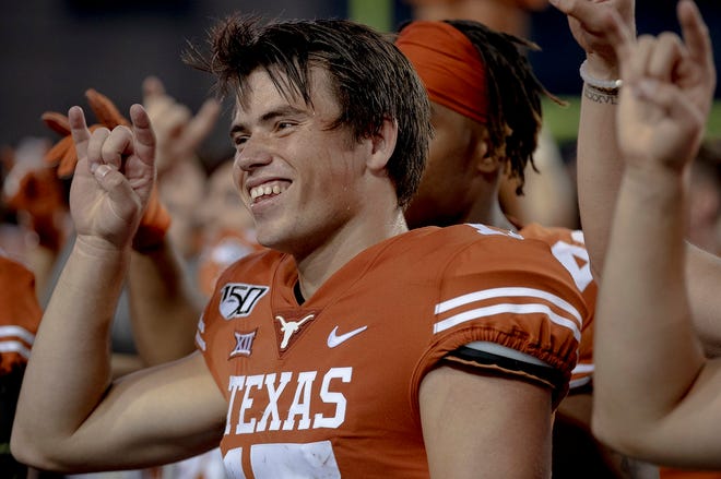 Texas kicker Cameron Dicker celebrates after kicking the game-winning field goal to beat Kansas State 27-24 in 2019. Dicker may pull triple duty this fall if he also has to assume punting duties.