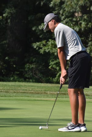 Orion’s Ian Bollinger putts on the ninth green during a varsity match with Williamsfield on Thursday, Aug. 19, at Oakwood Country Club, Coal Valley.