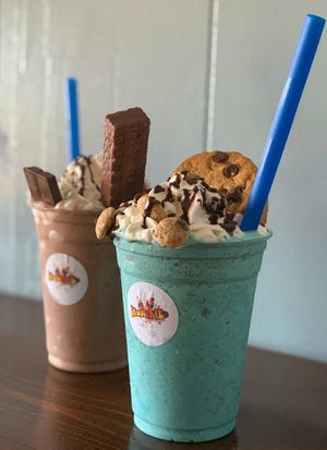 Death By Chocolate, left, and Cookie Monster shakes are on the menu at Munchies, a new eatery in downtown Freeport.