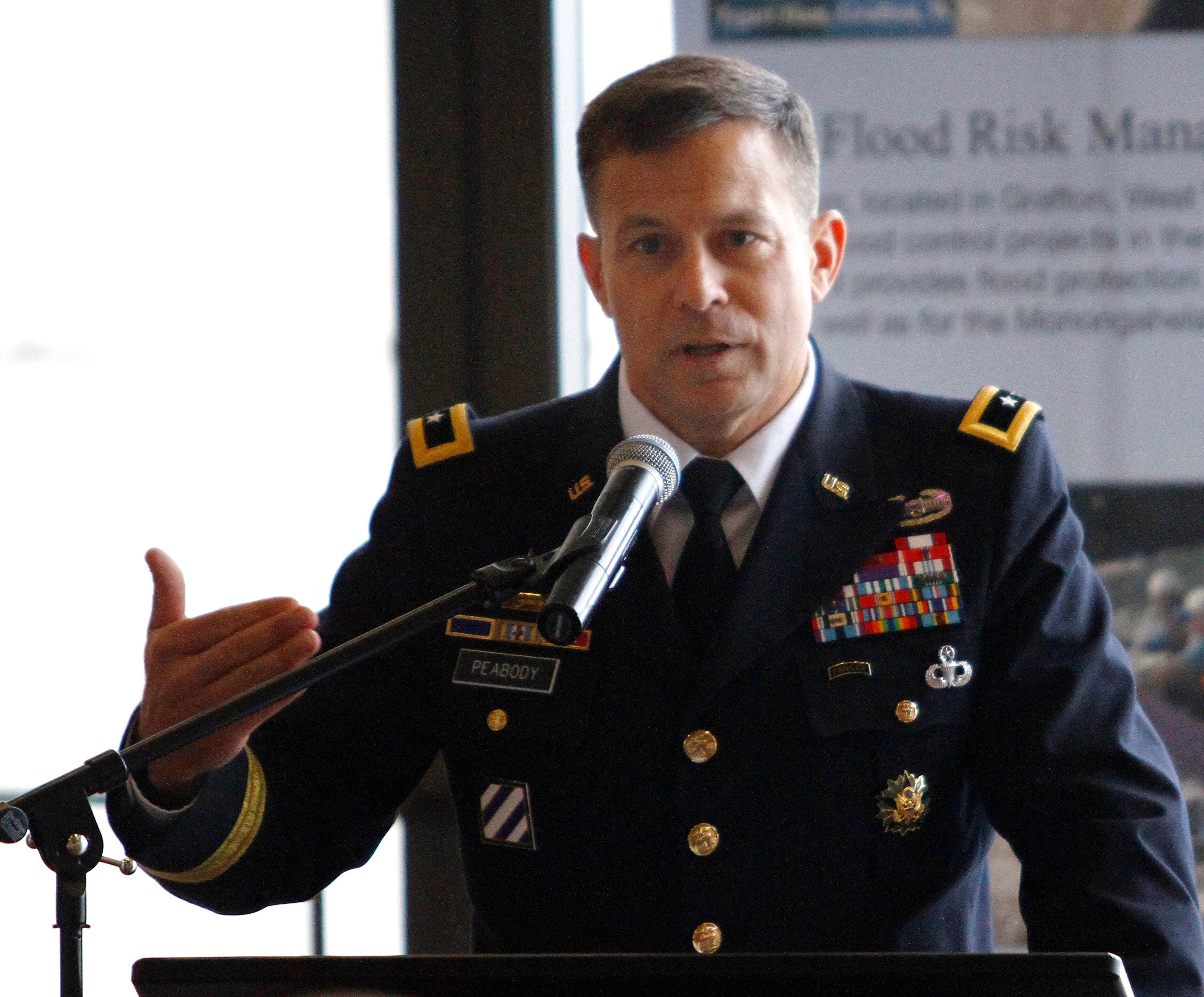 Former commander Maj. Gen. John W. Peabody makes a speech about his tenure during the change of command ceremony of the United States Army Corps of Engineers Great Lakes and Ohio River Division at the National Underground Railroad Freedom Center Museum in downtown Cincinnati, on Monday, Sept. 19, 2011.