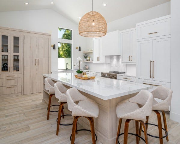 The transitional-inspired makeover of this kitchen transformed a tired, less functional very dark space into a dream kitchen.