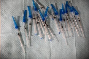 Syringes of the Pfizer-BioNTech COVID-19 Vaccine await patients during a COVID-19 vaccination clinic at Lancaster Health in Salem, Oregon on Tuesday, Aug. 24, 2021. 