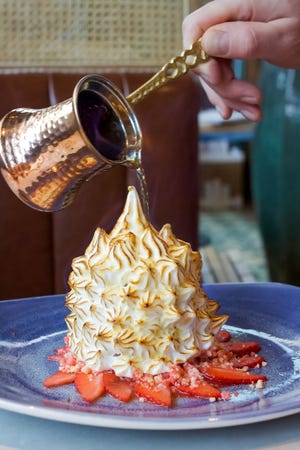 Baked Alaska is served at Rosewater Rooftop, located atop The Ray hotel in Delray Beach.