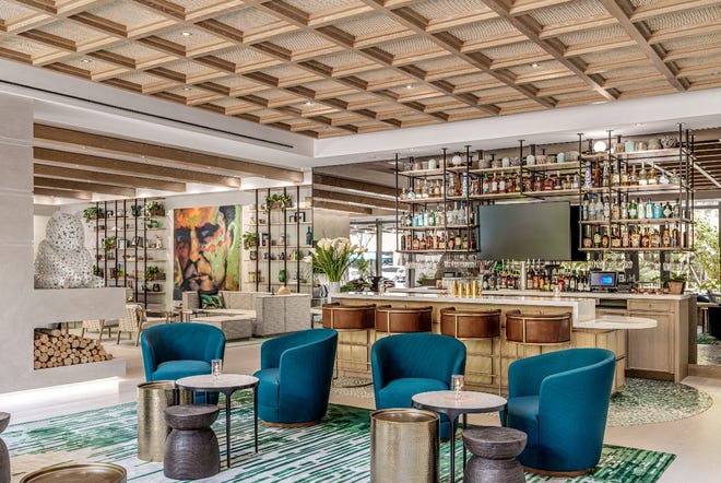 The Ray hotel's Lobby Bar offers a variety of seating, from its intimate bar area to other lounge-y nooks throughout the hotel's sprawling lobby in Delray Beach.