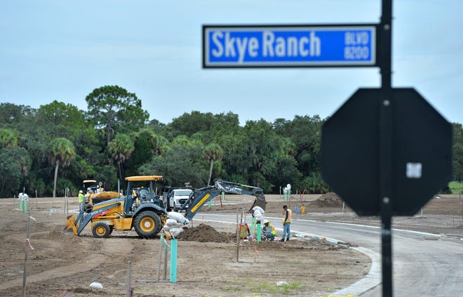 Utilities are being installed along new roads in Skye Ranch. Skye Ranch is a new residential development on Lorraine Rd., which has been extended south of Clark Rd. in Sarasota, Florida. When built out, the 1,000 acre community will consist of 1,200 single family homes and 360 townhomes.