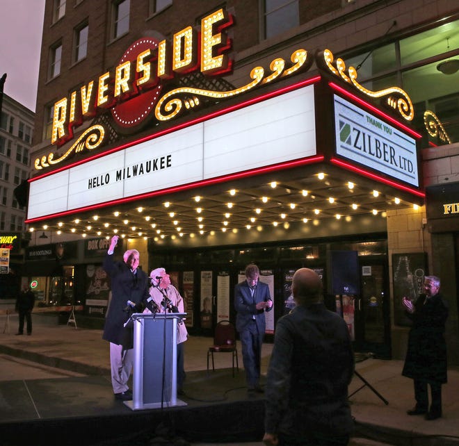 Milwaukee Mayor Tom Barrett and Michael Cudahy throw the switch to light the new Riverside Theater marquee on December 14, 2015.