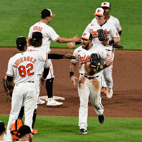 The Baltimore Orioles celebrate after defeating th