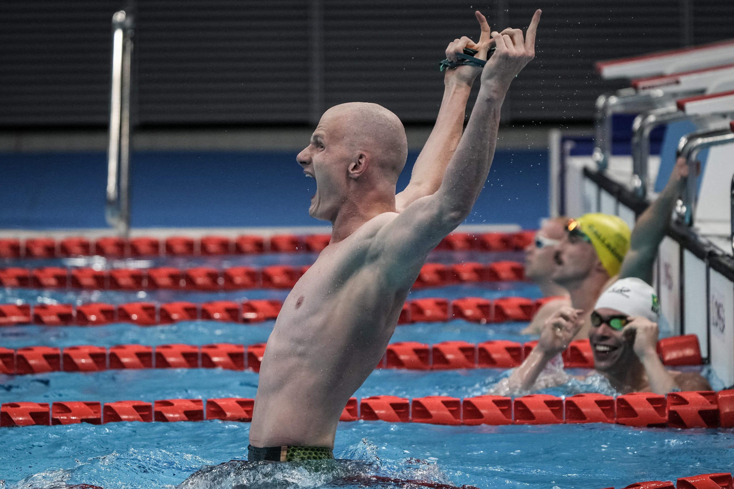 August 25, 2021: Australia's Rowan Crothers (L) reacts after winning the final of men's 50m freestyle (S10) at the Tokyo 2020 Paralympic Games at Tokyo Aquatics Centre in Tokyo.